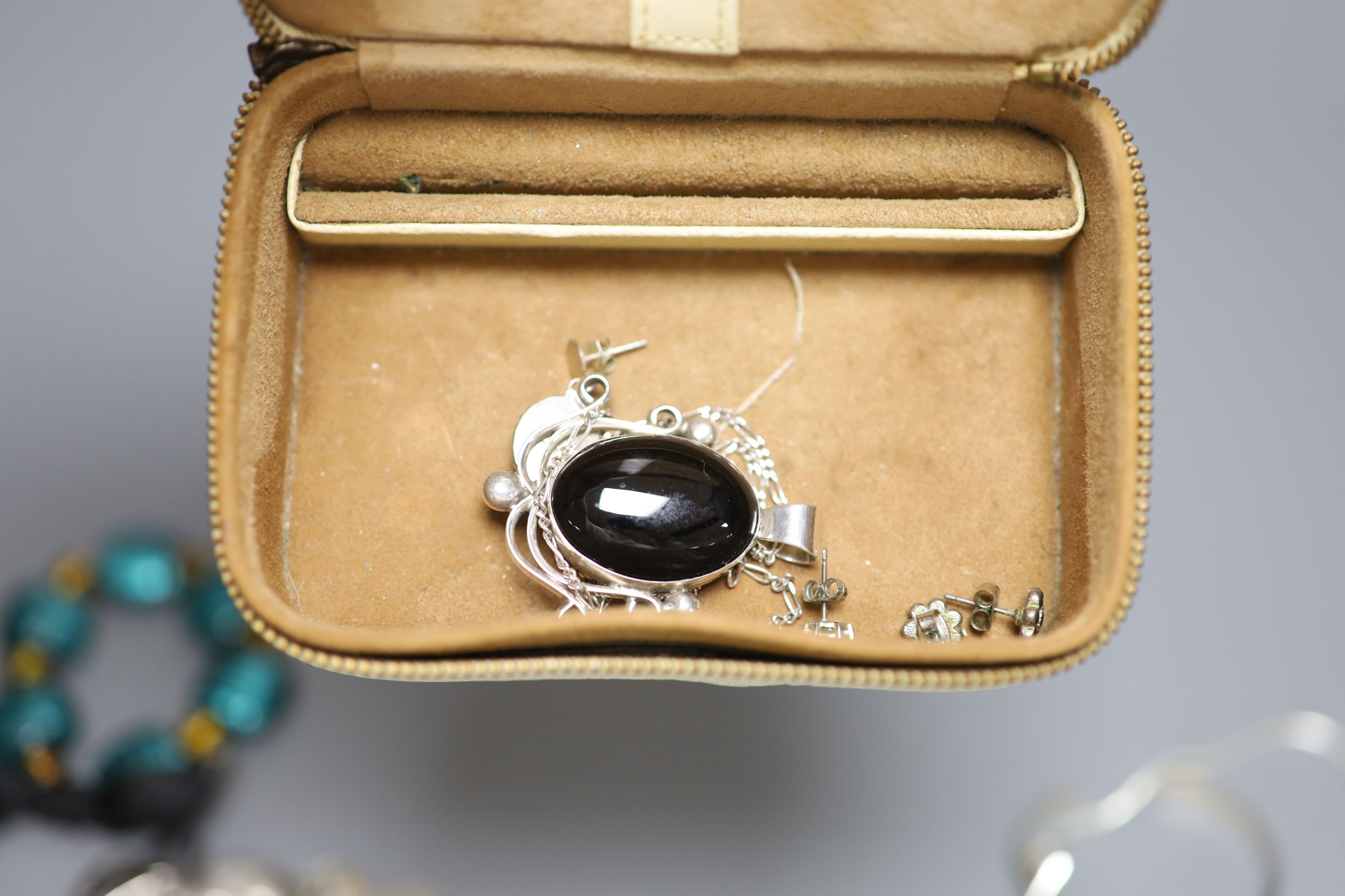 A ladys 9ct gold manual wind wrist watch and a small quantity of jewellery including white metal and costume.